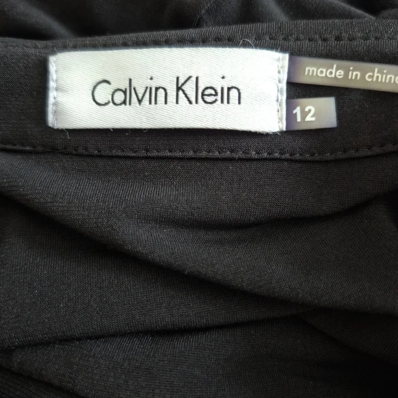 Calvin Klein Black and Gold Maxi Jumpsuit with Wide-Leg Design - Picture 7 of 8